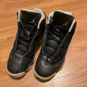 Black and teal jordans